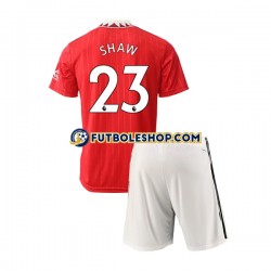 Primera Equipación del Manchester United Luke Shaw 23 2022-2023 Manga Corta para Niño (Camiseta y pantalón)