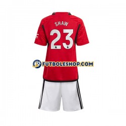 Primera Equipación del Manchester United Luke Shaw 23 2023-2024 Manga Corta para Niño (Camiseta y pantalón)